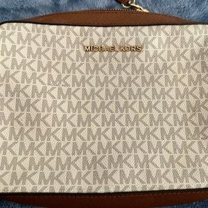 Ginny Medium Logo Crossbody Bag gently used and cared for gold accents